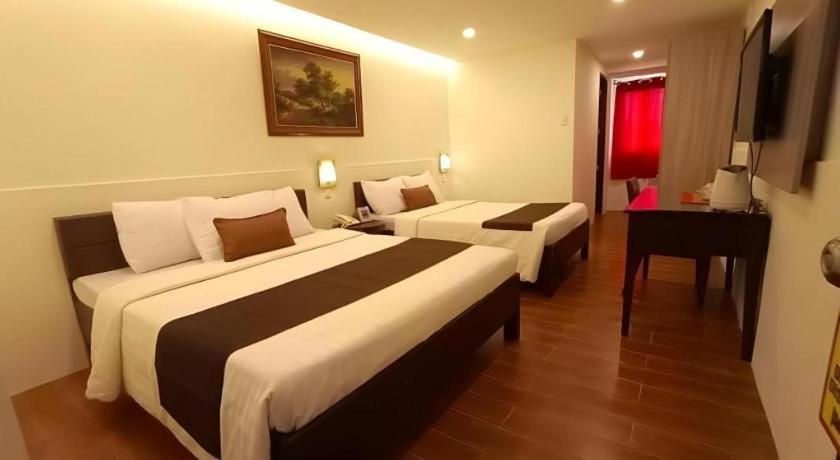 Hotel Asuncion Лаоаг Екстер'єр фото